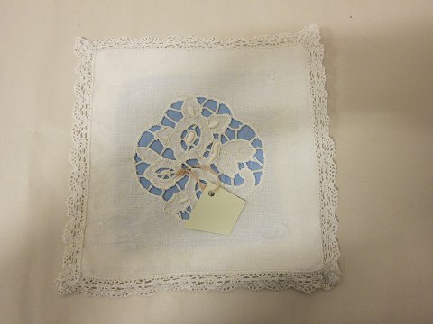 Dust cover for the old and beautiful handkerchiefs, old and with embroidery made 
by hand
In the earlier days the beautiful handkerchiefs were kept in such dust covers, 
usually with hand made embroidery
In a good condition