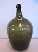 Glasflasche
Eine alte grüne Glasflasche 
Grösse: 5 liter 
H: 33cm
