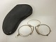 A pair of glasses incl. case
An old pair of glasses to place at the nose incl. 
case on which is written: A. M. Berg, Odense