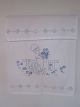 Parade piece
A beautiful old parade piece with handmade blue 
embroidery
The parade piece was in the good old days used to 
hang in front of the tea towels so that all things 
always looked clean and beautiful
105cm x 69cm
The antique Danish linen is our