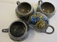 For the collector:
Mugs/cups from W. Germany, no. 136 (Please see 
the photos)
Very rare items from West Germany
The price is for all 4 items.