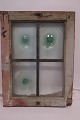 Window Frame with 3 of the special antique glass
"Bottle bottom glass" i.e. a thick glass 
originally made as a windows glass
Window frame: 54cm X 41cm
Each of the 4 window-glasses is 21,5cm x 15cm
About the end of the 1700'th
Antique and rear