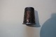 Old thimbles made of silver
With a red Fluss
With a beautiful decoration in the silver
No stamp