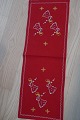 An old table cloth for the christmas, with 
embroidery, with angels, handmade
62cm x 44cm
In a good condition
We have a good selection of handmade table 
clothes