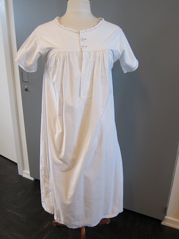 Shift / dress
An old shift with emboidery initials hand made, the old linen buttons, gusset 
in the seam in the side etc.
The antique, Danish linen and fustian is our speciality and we always have a 
large choice of shifts, babydress etc.