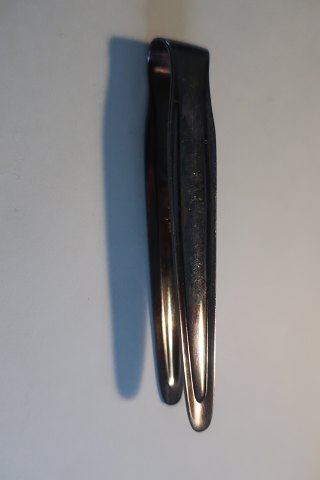 Antique, small and beautiful sugar tongs from Würtenbergische Metalwaren Fabrik 
(WMF) 
With a stamp "WMF"
L: 7cm
W: 1,5cm
In a good condition