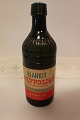 Gammel original flaske med etiketten "Blankit 
Gulvpolish - Voksbonemiddel"
Fra "S. Dyrup & Co. Aktieselskab København"
Vi har et stort udvalg af gamle købmandsvarer