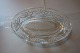 Gammelt rivejern af glas
Det har specielt været brugt til at rive æbler, 
og det giver meget saftige æbler, da saften 
forbliver ved æblerne
L: ca 26cm
Fra 1900-tallet