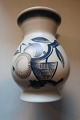 Vase fra RC (Royal Copenhagen)
Stemplet: København, Danmark, 31/1
H: ca. 13,5cm
Ca. 1940
Har et lille skår i bunden (se foto), men ellers 
god stand