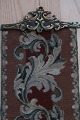 An old bell wire
Handmade with petit point (very tiny cross stiches)
Please note the beautiful item for the hanging
