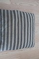Fustian (olmerdug) made of flax
This antique, Danish fustian is in the old hand-woven/home-woven quality from 
the years when that was the way to do it and it is NOT industrial produced
This fustian is  stout and closely woven and it is as a cushion