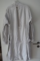 Shift / dress made of flax, with long sleeves
An strong, antique shift with hand made buttonholes, embroidered hand-made 
initials and other items to make the dress beautiful
The antique, Danish linen and fustian is our speciality